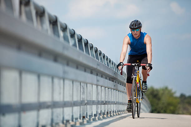 istock professional biker riding on race bike 119605692