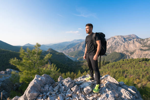 istock Hiker on top of mountain 1196057264