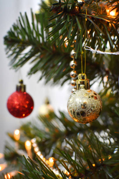 istock Christmas Tree, Ornaments and Defocused Lights Background 1196059132