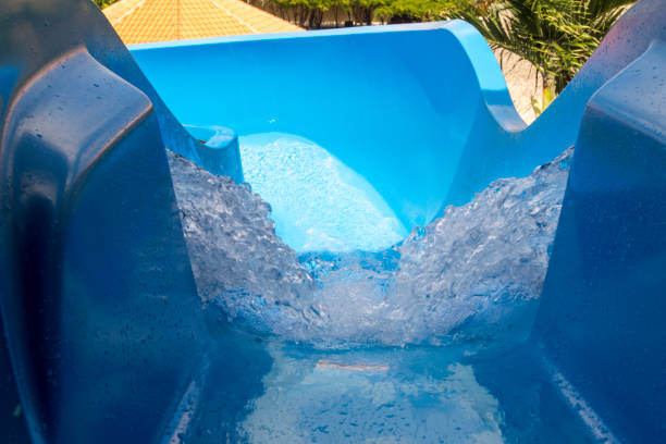 Top of a Waterslide at Resort Hotel This picture shows the entrance to a waterslide. This slide was found at a resort hotel. top of water slide photos stock pictures, royalty-free photos & images