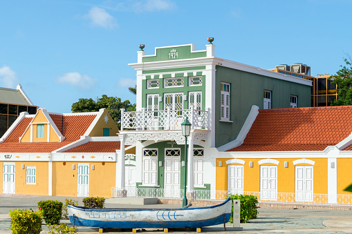 This shot was taken outside of one of the Archaeological Museum in the city of Oranjestad in Aruba.  The architecture of the city has Dutch influences combined with the bright colors typical of a Caribbean island.  Most buildings include tile roofs which are ideal for the island's arid climate.