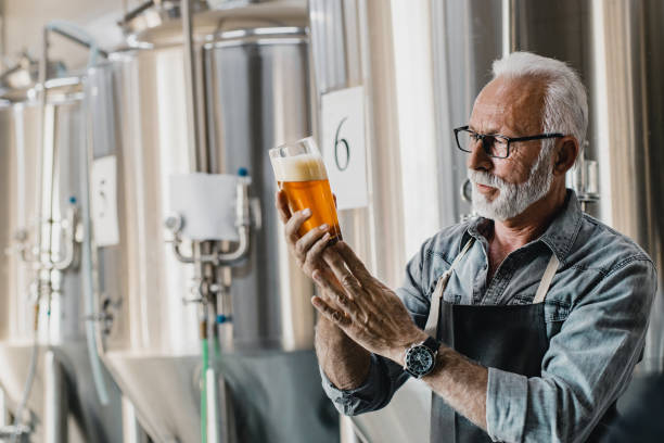 istock Senior men checking the quality of beer 1196062841
