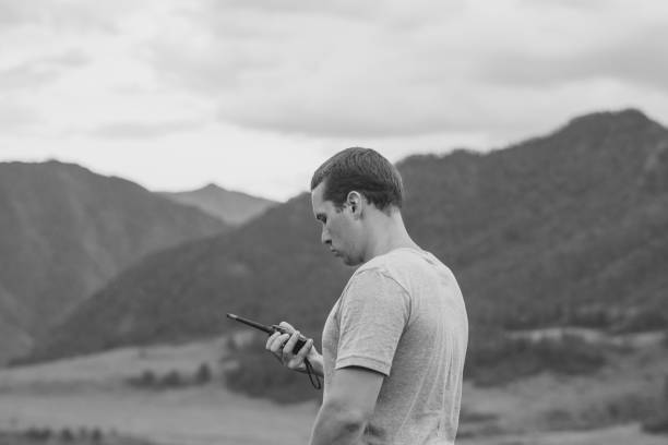 istock a man talking on the radio 1196064897