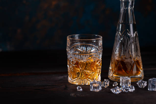 istock Whiskey in glass with ice 1196065019