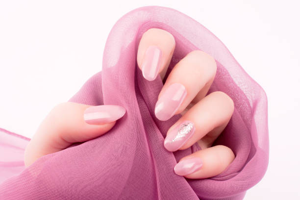 istock shiny pink rose nails manicure 1196067011