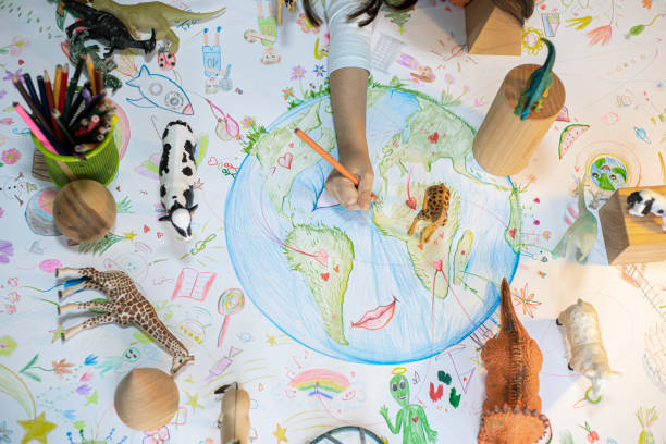 istock Children's drawing of planet Earth 1196070961