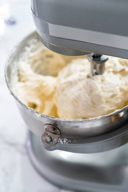 istock Making buttercream frosting for decorating a vanilla cake. 1196074554