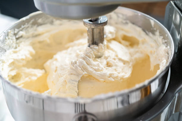 istock Making buttercream frosting for decorating a vanilla cake. 1196075222