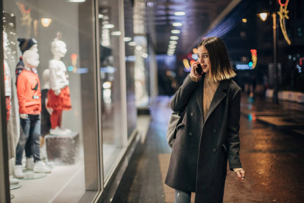istock Young woman is talking on phone 1196078428