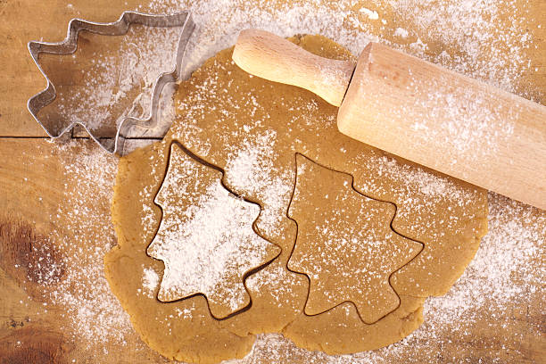 istock christmas gingerbread tree cookies with cutter 119608155