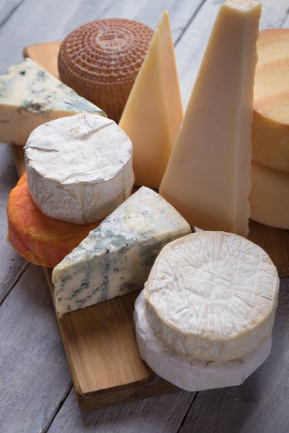istock Aged cheese round and slices 1196083904