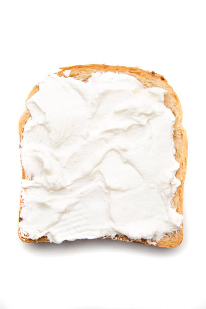 istock Slice of bread with sour cream spread on top 1196084061