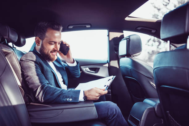 istock Handsome Male Businessman Arranging Schedule And Using Phone 1196084282