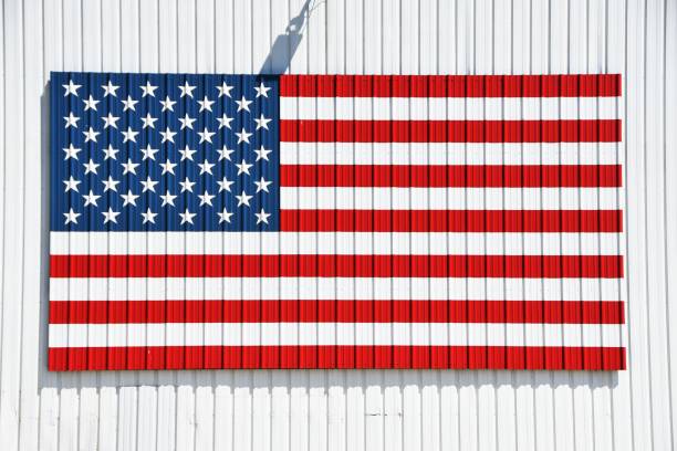 istock USA Flag on Building 1196084846