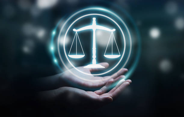istock Businesswoman on blurred background using law protection right 1196084882