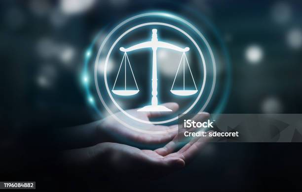 Businesswoman On Blurred Background Using Law Protection Right Stock Photo - Download Image Now