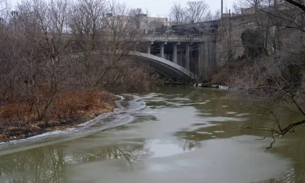 Photo of Bridge over icy river water