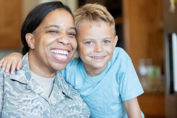 istock Military mom with young son 1196098846
