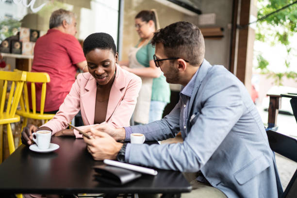 istock Business people having a meeting in a restaurant 1196102343