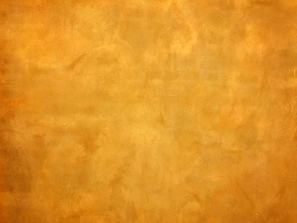 istock Yellow and soft light concrete cement for abstract and backgrounds 1196104375