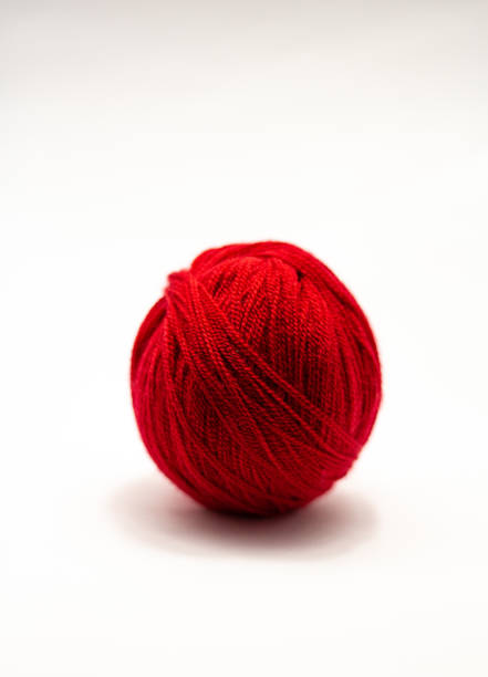 istock Red Lurex Fiber Yarn 1196105151
