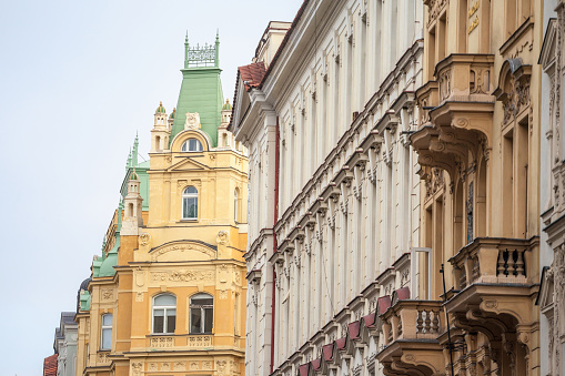 Picture of facades in the old town of Prague, Czech Republic, abiding by the rules of Austro-Hungarian architecture. The old town of Prague is the oldest part of the Czech capital city, and a tourism landmark.