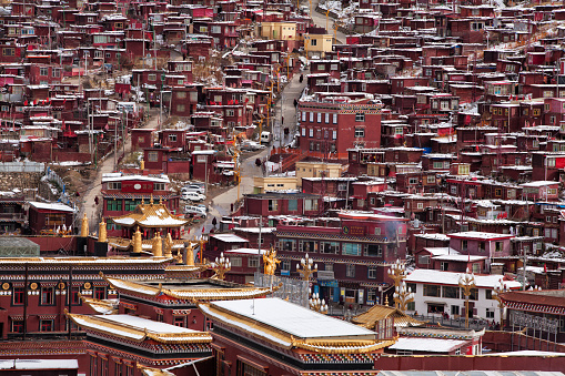 Seda Wuming Buddhist College and the residential houses in the snow, Sichuan province, China