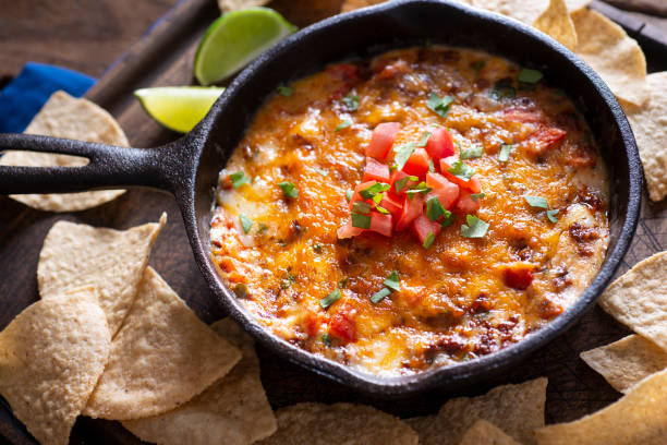 Skillet Queso Homemade Queso Fundido with Chorizo Sausage dipping sauce stock pictures, royalty-free photos & images