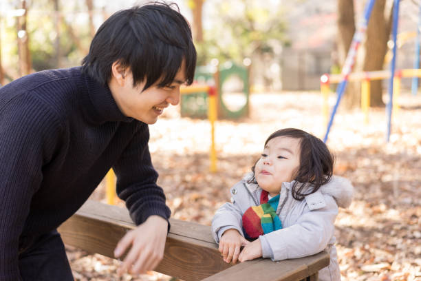 Father and child (park / natural family image) Father and child (park / natural family image) image. role reversal stock pictures, royalty-free photos & images