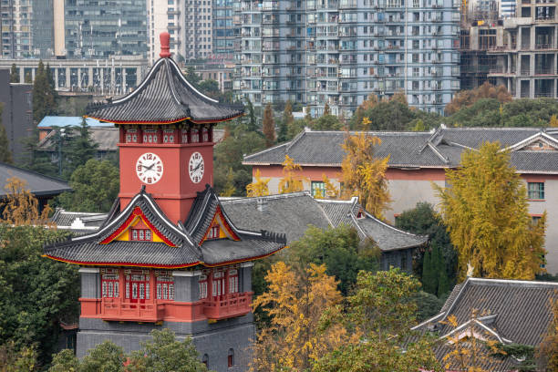 Chengdu Sichuan Huaxi university campus clock tower in autumn stock photo