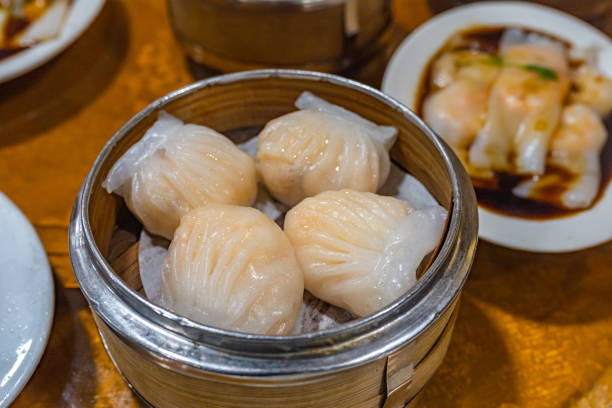 istock Dedicated crystal shrimp dumpling in Chinese dimsum steamer box 1196137167