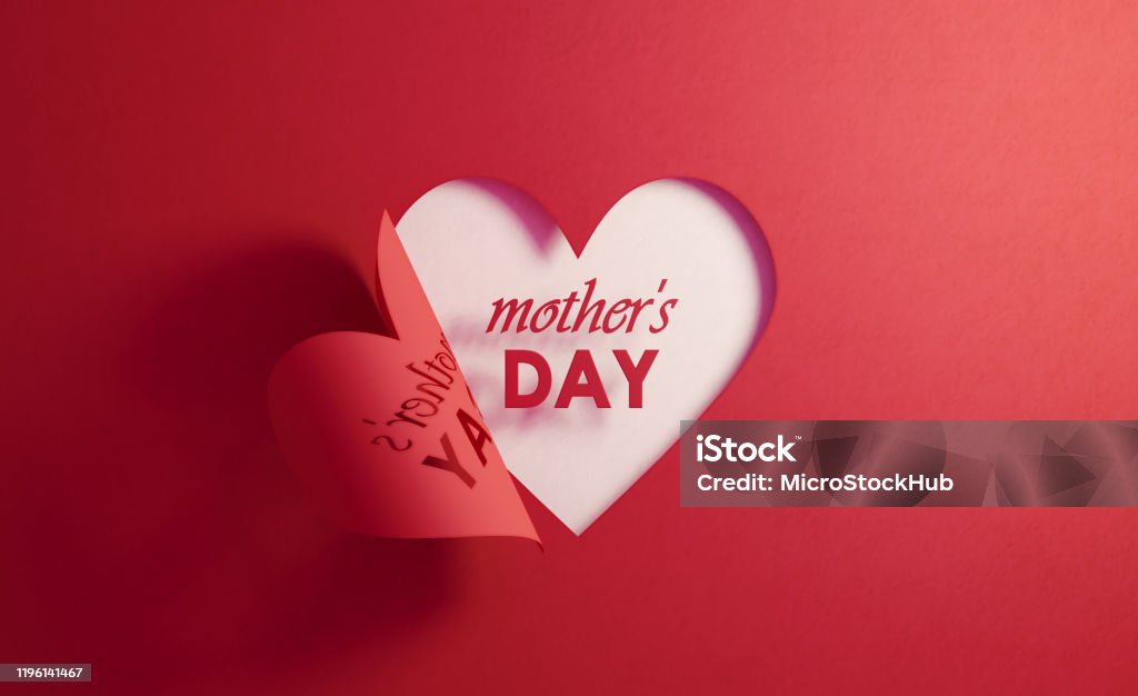 Mother's Day Concept- Mother's Day Text Inside Of A Red Folding Heart Shape On White Background Mother's Day text is inside of a red folding heart shape on white background. Horizontal composition with  copy space. Mother's Day Stock Photo