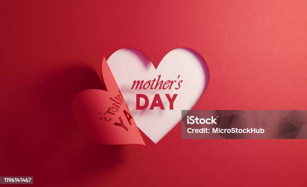 Mothers Day Concept Mothers Day Text Inside Of A Red Folding Heart Shape On White Background Stock Photo - Download Image Now