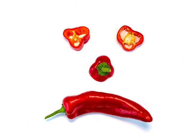 istock Sliced red pepper on a white background with place for text. 1196141670