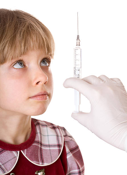 istock Vaccination of child. Isolated. 119614313