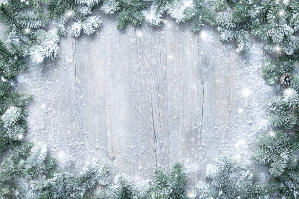 istock Christmas and New Year background with fir branches and snowfall 1196144174