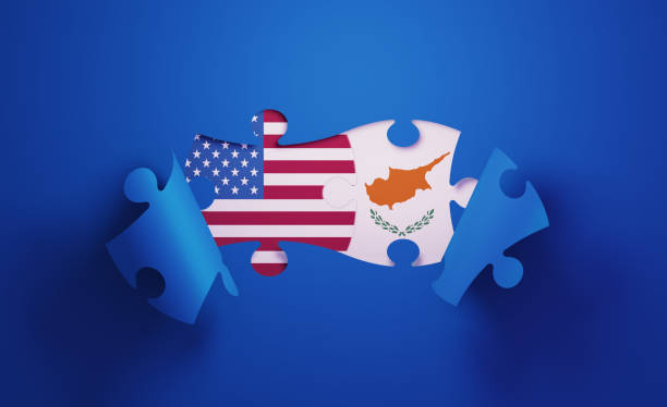 istock Jigsaw Puzzle Pieces Textured With American and Cypriot Flags 1196144278