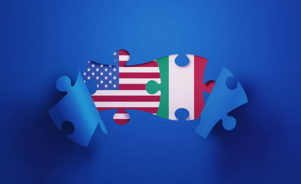 istock Jigsaw Puzzle Pieces Textured With American and Italian Flags 1196144812