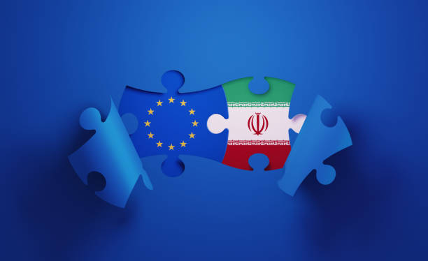 istock Jigsaw Puzzle Pieces Textured With European Union and Iranian Flags 1196145377
