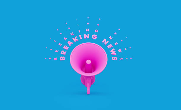 istock Pink Megaphone and Breaking News Text over Blue Background 1196145539