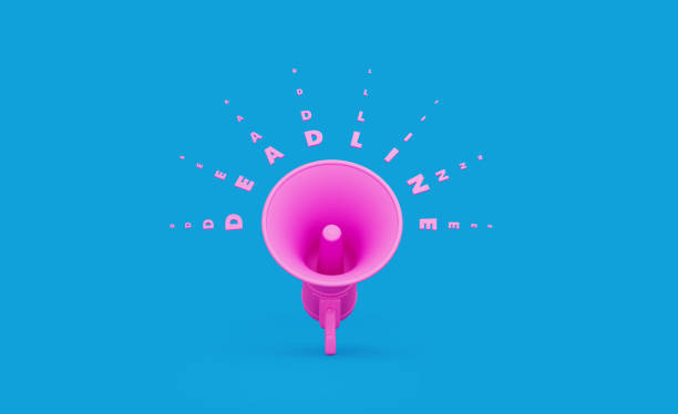istock Pink Megaphone and Deadline Text over Blue Background 1196145570