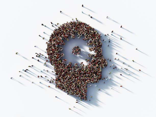 istock Human Crowd Forming A Male Head with Gear Symbol on White Background: Teamwork Concept 1196146170