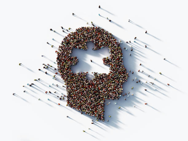 istock Human Crowd Forming A Male Head with Jigsaw Puzzle Symbol on White Background: Solution Concept 1196147657