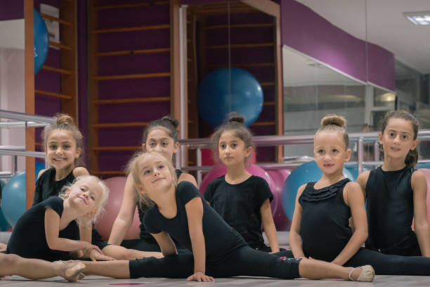 istock Young Girls Preparing for Ballet Training Indoors 1196150457