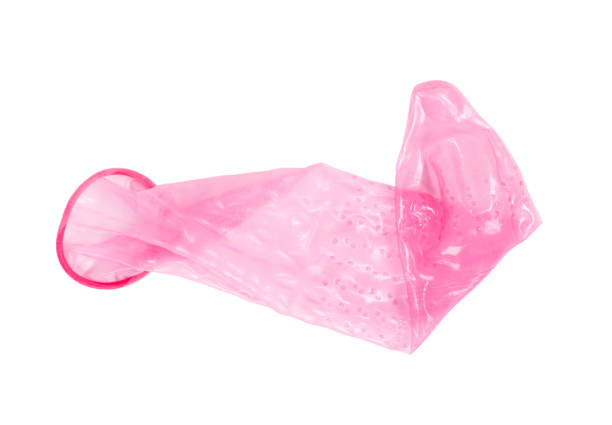 istock Red condom, isolated on a white background 1196152626