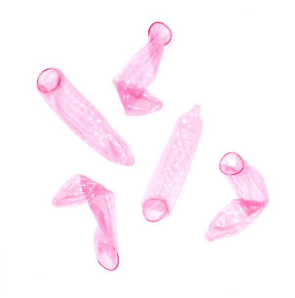 istock Red condom, isolated on a white background 1196152687