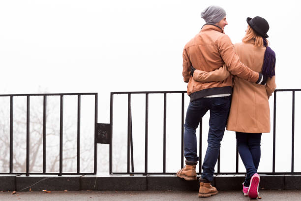 istock Couple outdoors  enjoying nice autumn / winter time. 1196160367