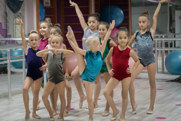 istock Little Acrobatic Dancers posing on camera 1196161060