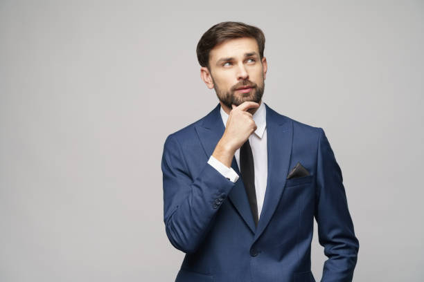 istock Studuo shot of thinking businessman wearing suit 1196163339