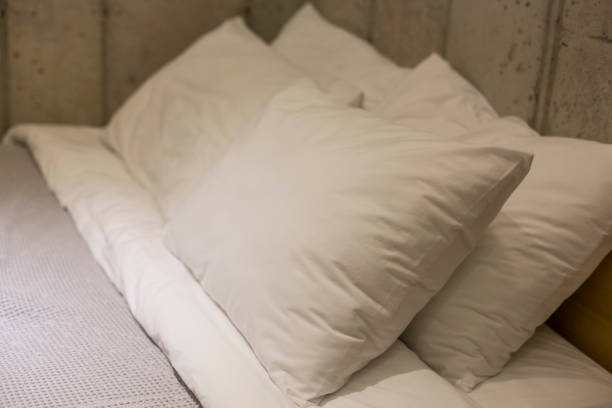 istock Pillows on a bed soft pillows on the bed 1196165733